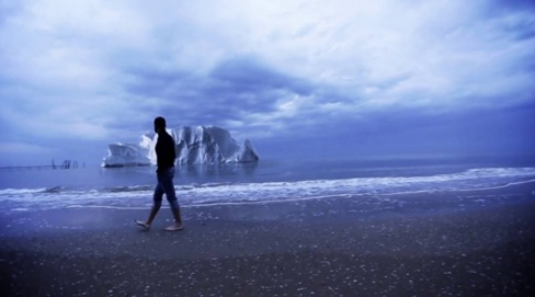 man lives on melting iceberg