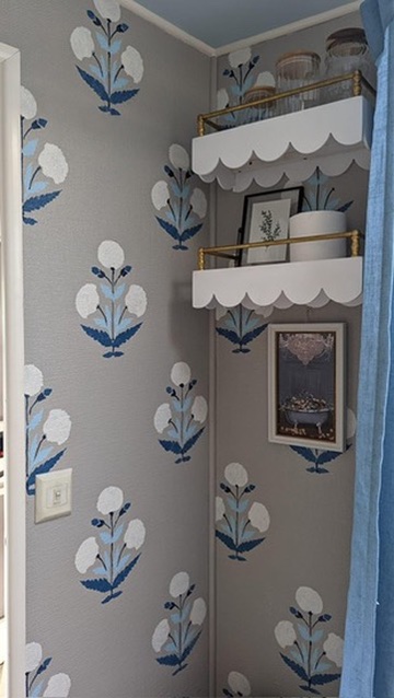 renovated camper, french countryside and southern belle design with printed haint and gray wallpaper for the bathroom storage