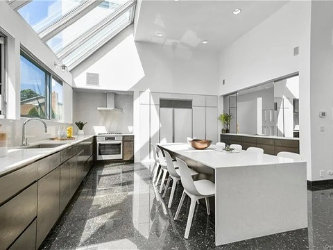 New Rochelle beach house in New York, kitchen with skylight roof ceiling