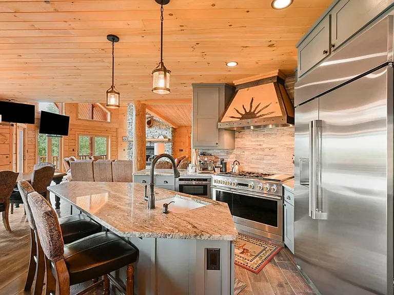 Hunter Mountain, NY ski chalet, log cabin kitchen with gray cabinets and granite countertops