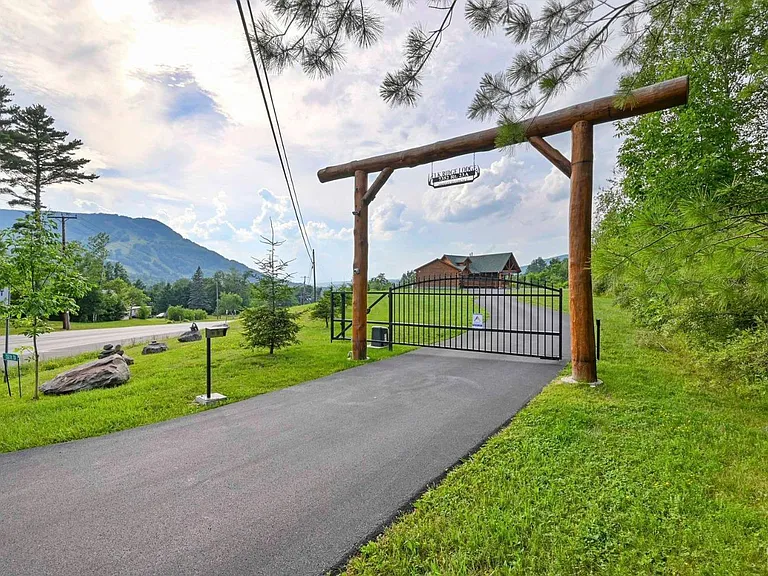 Hunter Mountain, NY ski chalet, front gate with wood arch