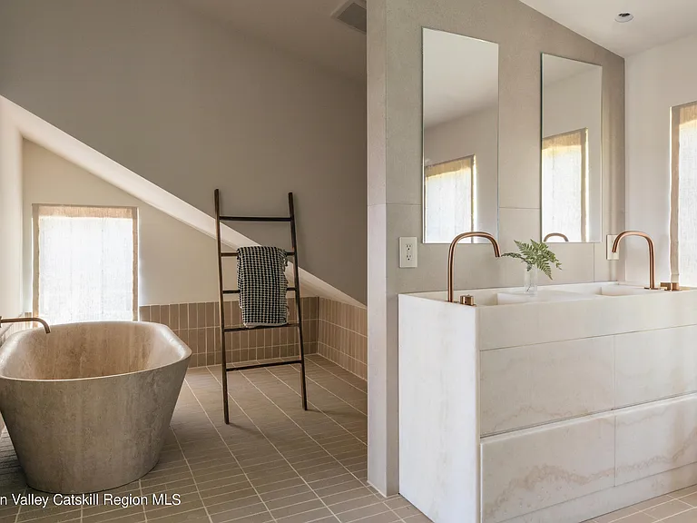 Highland, NY estate with neutral colors, neutral modern batrhoom with soaking tub