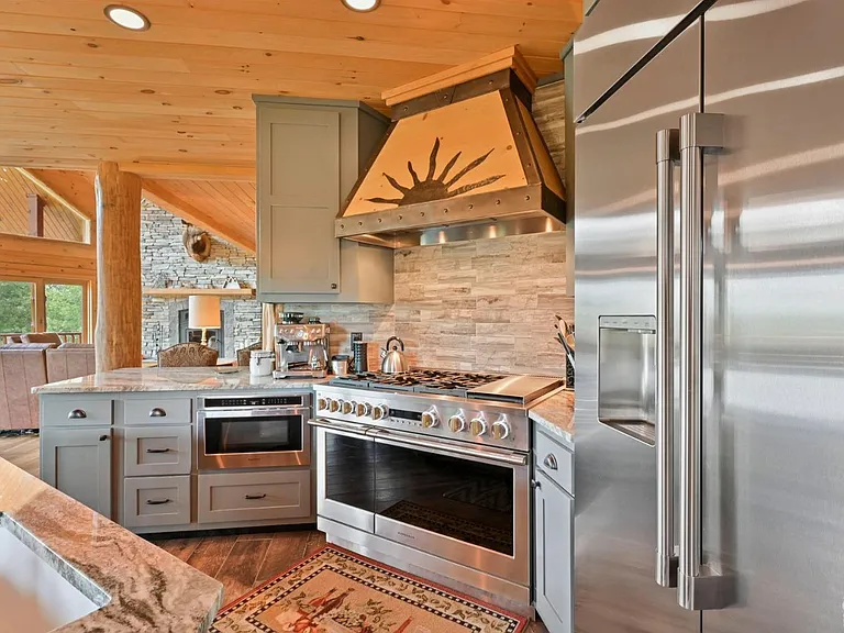 Hunter Mountain, NY ski chalet, log cabin kitchen with gray cabinets and granite countertops