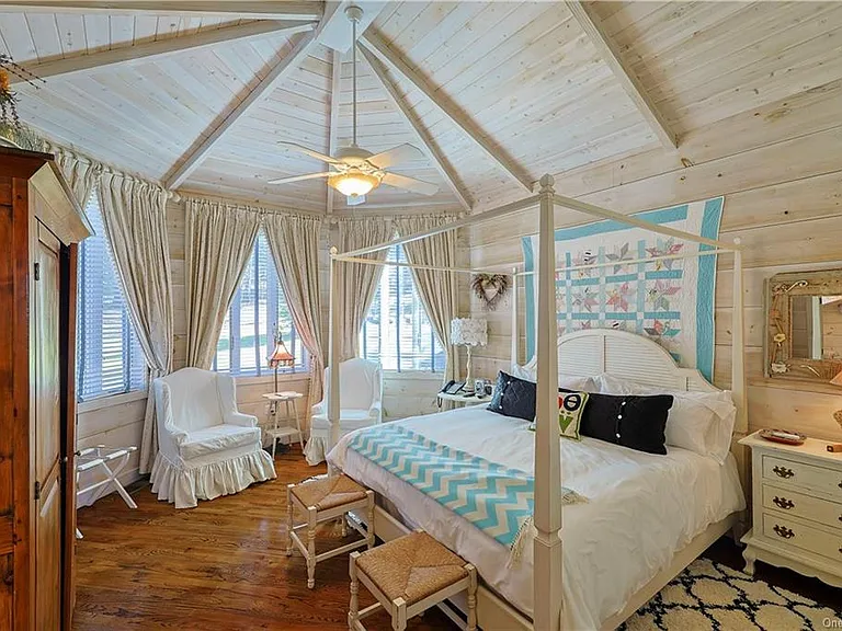 Bedroom with vaulted ceilings at 295 Co Road 2A, Olivebridge, NY 12461, Rustic Catskills Cabin Estate