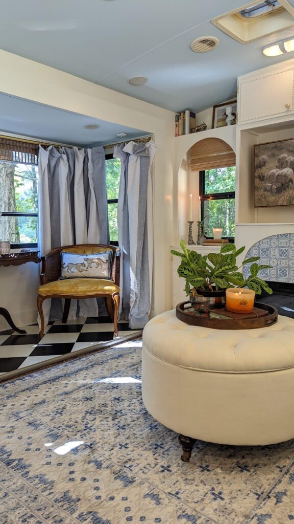 renovated camper, french countryside and southern belle design choices with washable rugs and soft color palettes