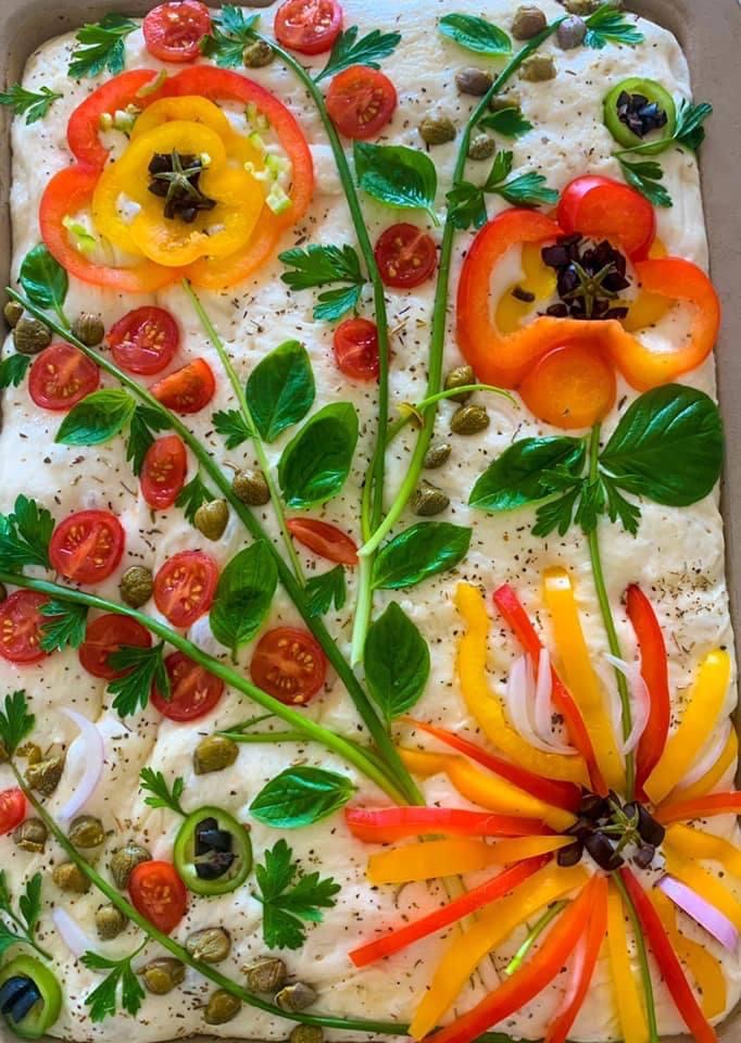 focaccia art, focaccia bread with beautiful flowers and greenery