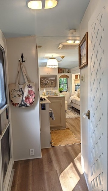 renovated camper, french countryside and southern belle design hallway with floral detailing