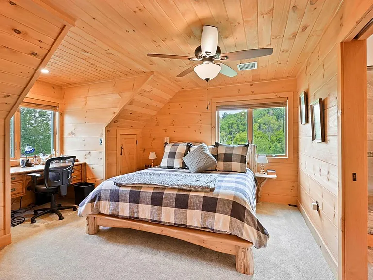 Hunter Mountain, NY ski chalet, log cabin bedroom with natural live edge wood bed