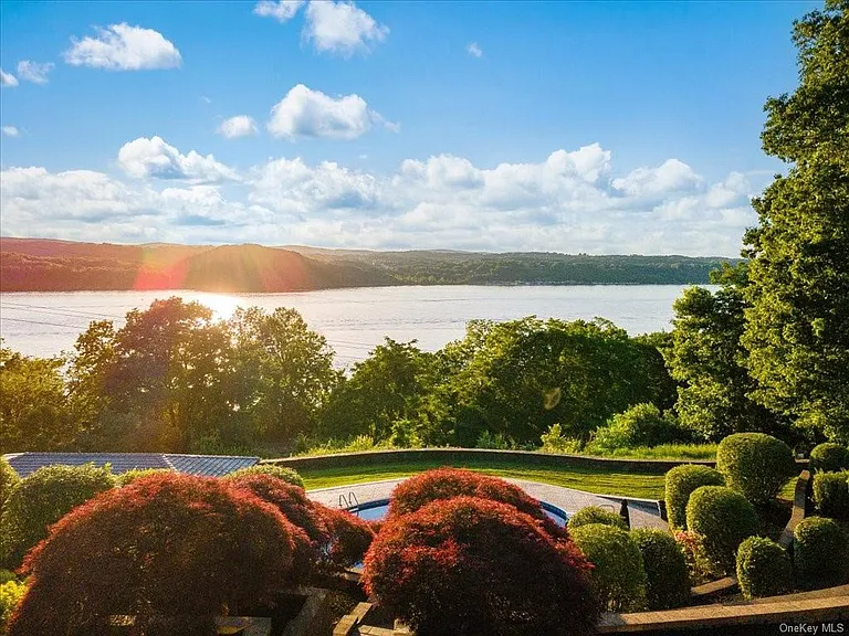 Wappingers Falls NY mansion compound overlooking the Hudson River, bluestone seating area overlooking the hudson river