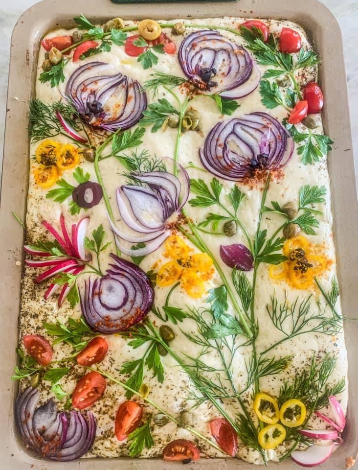 focaccia art, focaccia bread with beautiful flowers and greenery