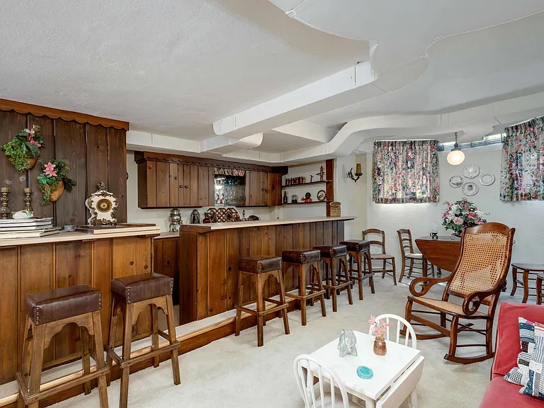 vintage Rock Island Illinois house, vintage basement and TV room with built-in wood bar