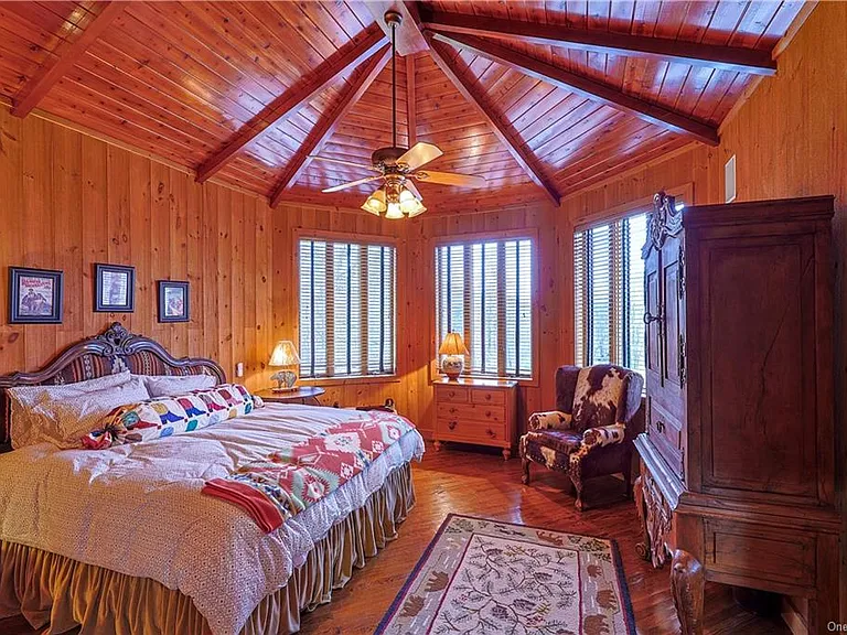 Bedroom with vaulted ceilings at 295 Co Road 2A, Olivebridge, NY 12461, Rustic Catskills Cabin Estate