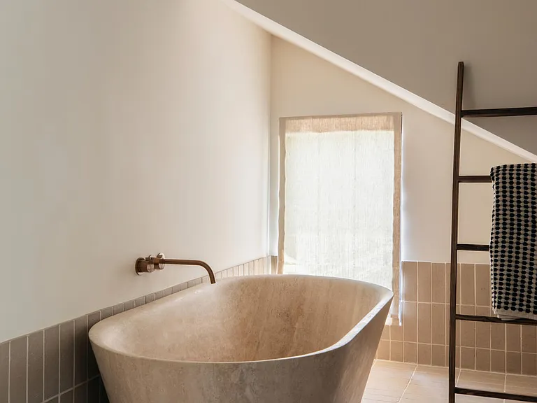 Highland, NY estate with neutral colors, neutral modern batrhoom with soaking tub