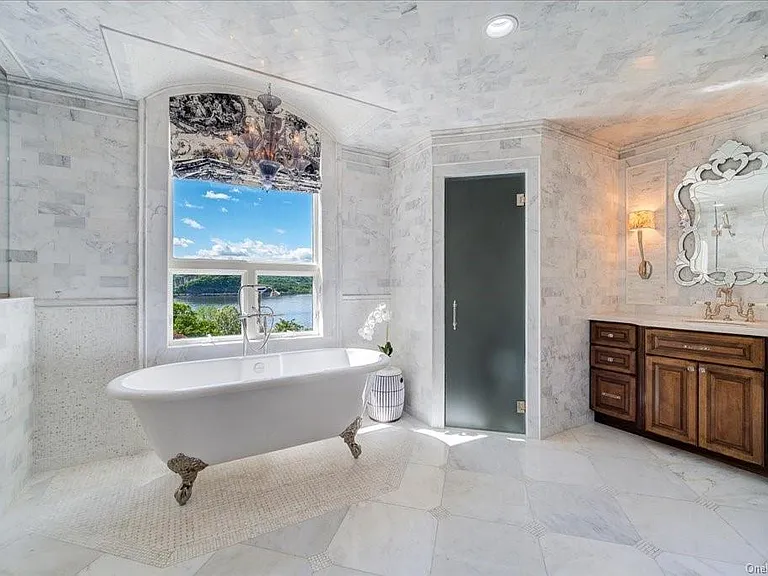 Wappingers Falls NY mansion compound overlooking the Hudson River, clawfoot vintage tub overlooking the hudson river