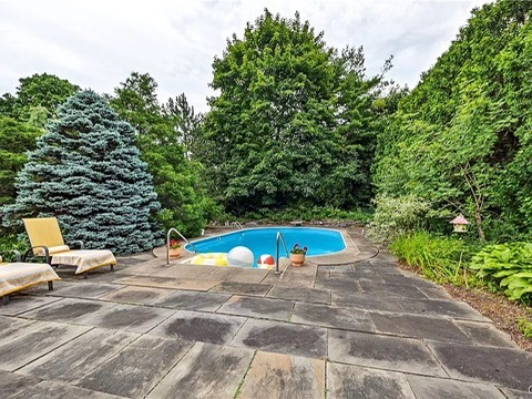 vintage MCM Fayetteville, NY house for sale with retro details, midcentury in-ground swimming pool