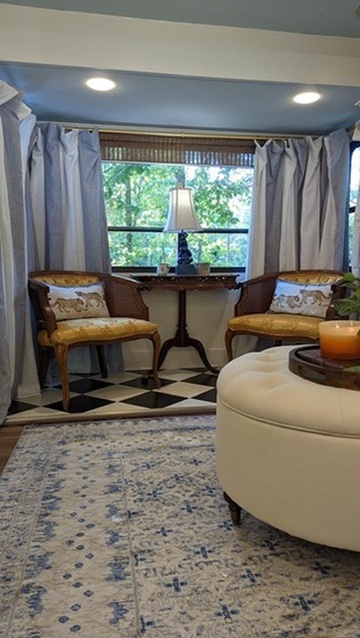 renovated camper, french countryside and southern belle design sitting area with velvet arm chairs