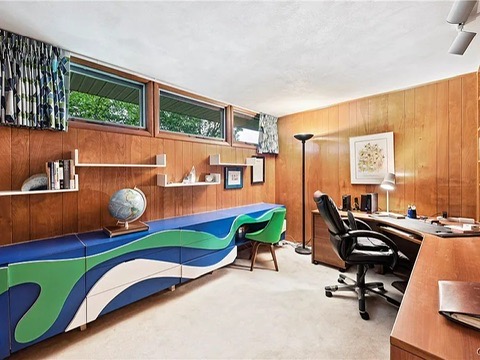 vintage MCM Fayetteville, NY house for sale with retro details, midcentury bedroom and home office with unique mcm credenza