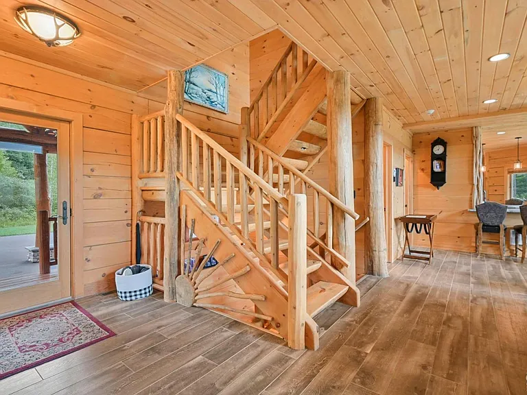 Hunter Mountain, NY ski chalet, natural wood and shaved log staircase