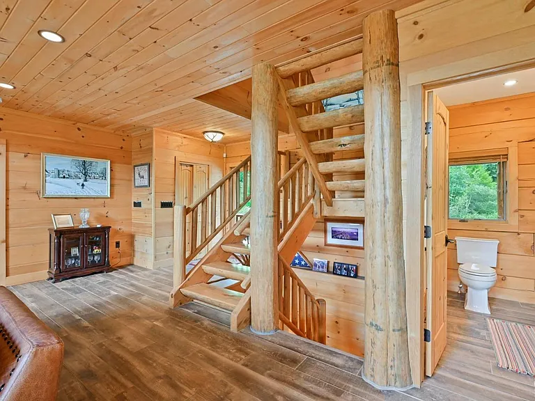 Hunter Mountain, NY ski chalet, natural wood and shaved log staircase