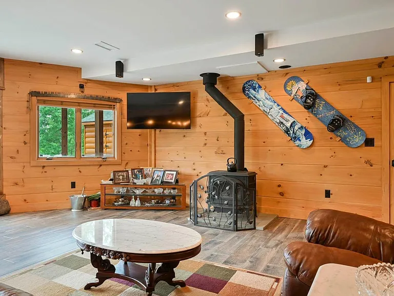 Hunter Mountain, NY ski chalet, natural wood home bar and entertainment room with wood burning stove