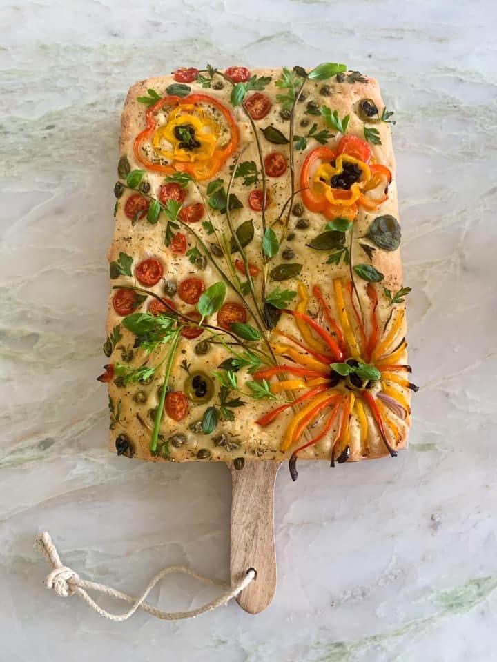 focaccia art, focaccia bread with beautiful flowers and greenery