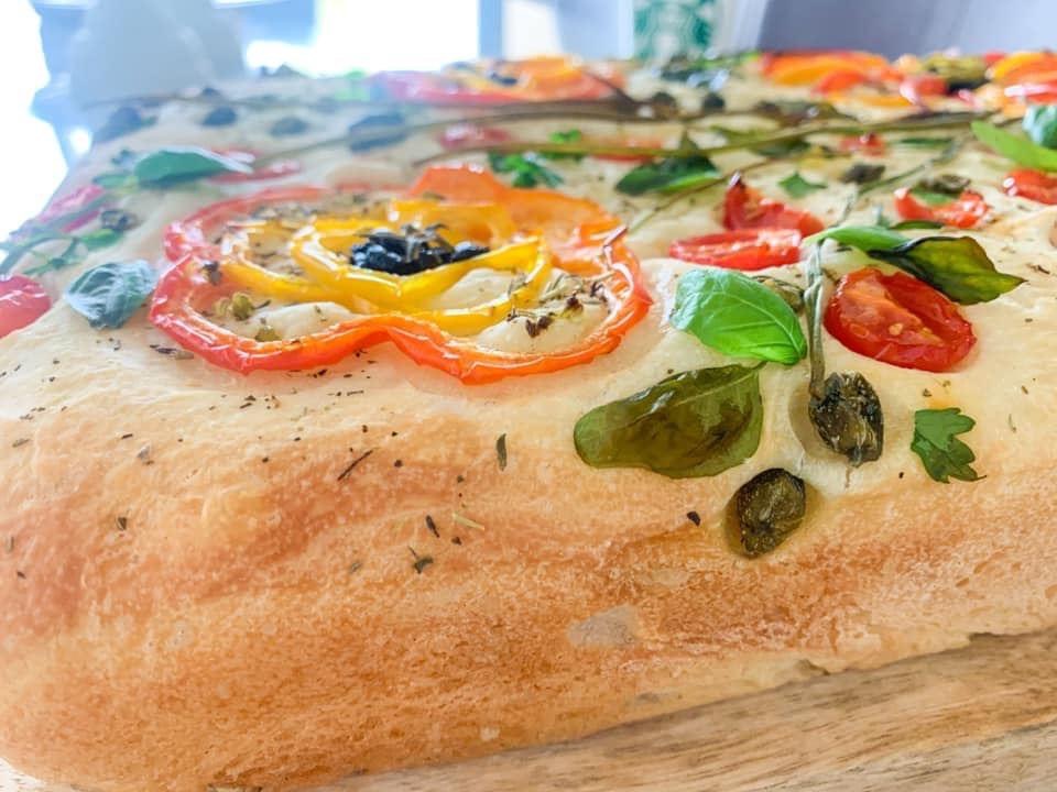 focaccia art, focaccia bread with beautiful flowers and greenery