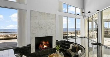 New Rochelle beach house in New York, sunken tile conversation pit and fireplace overlooking the Long Island Sound