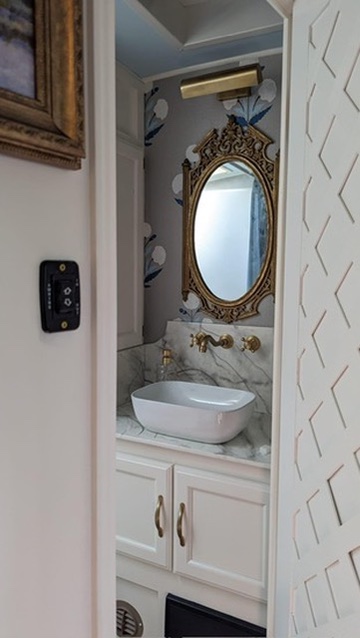 renovated camper, french countryside and southern belle design bathroom with basin sink and vintage mirror