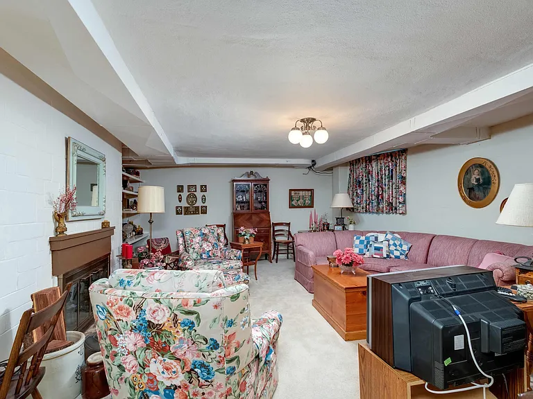 vintage Rock Island Illinois house, vintage basement and TV room with built-in wood bar