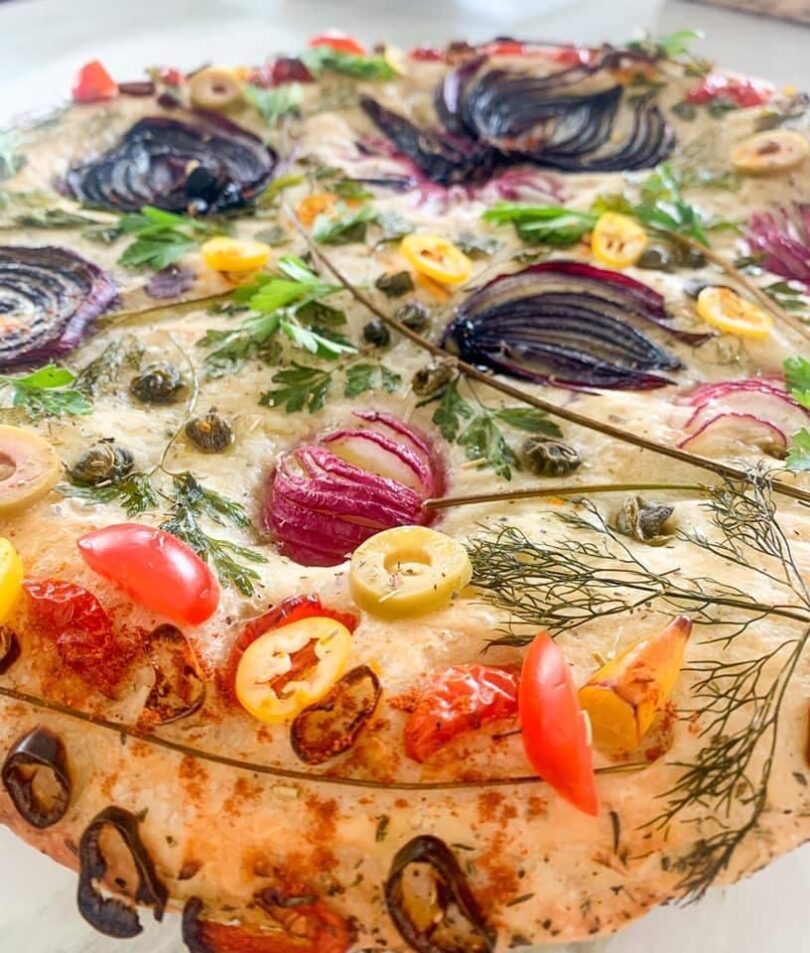 focaccia art, focaccia bread with beautiful flowers and greenery