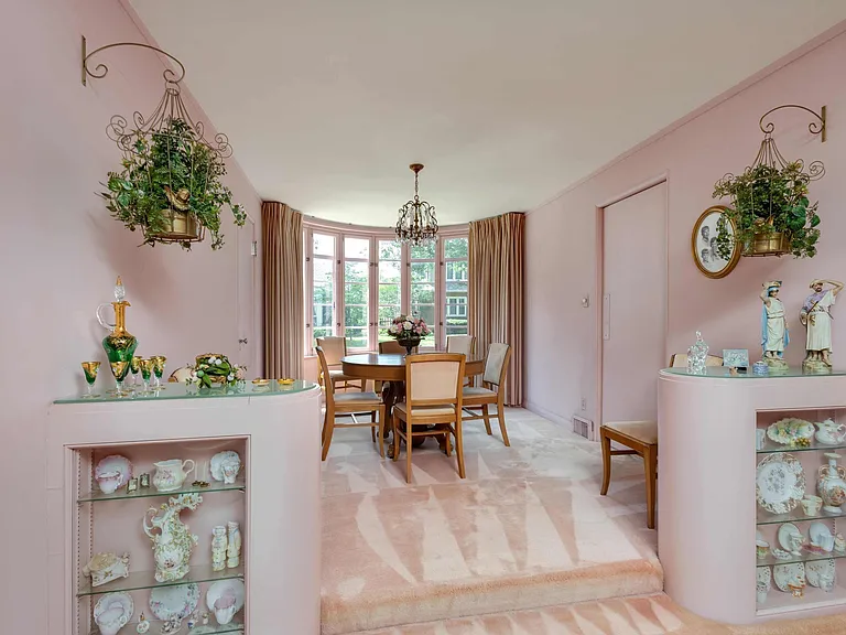 vintage Rock Island Illinois house, wall to wall pink carpet in the dining room and living room