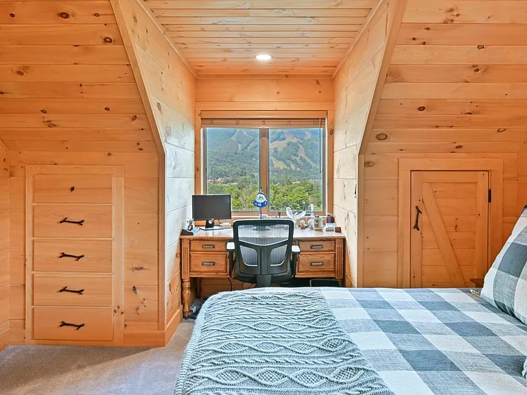 Hunter Mountain, NY ski chalet, log cabin bedroom with natural live edge wood bed