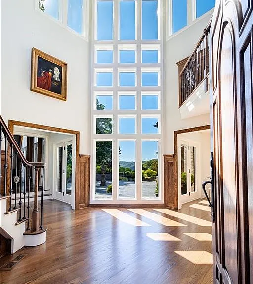 Wappingers Falls NY mansion compound overlooking the Hudson River, wood foyer with massive ceilings