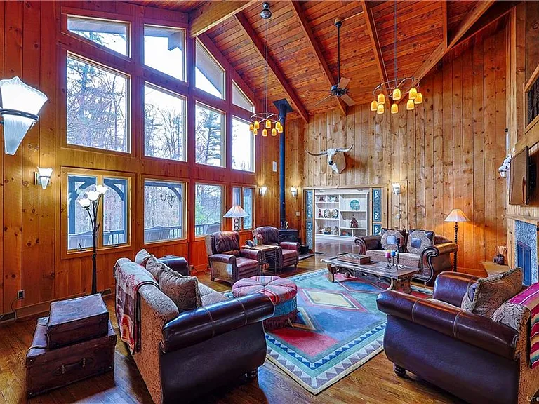 Living room with vaulted ceilings at 295 Co Road 2A, Olivebridge, NY 12461, Rustic Catskills Cabin Estate