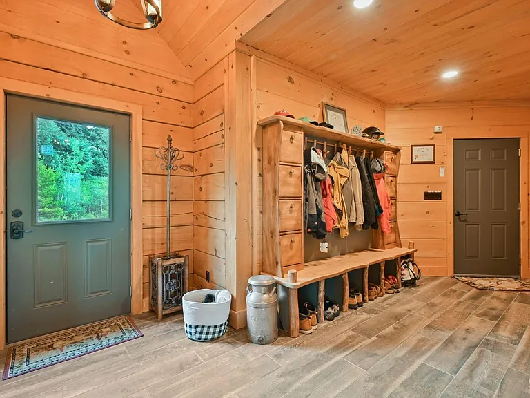 Hunter Mountain, NY ski chalet, natural wood mud room cubbies with live edge finishing