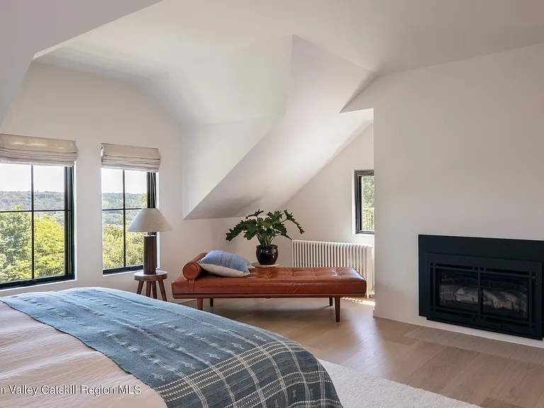 Highland, NY estate with neutral colors, neutral modern bedroom