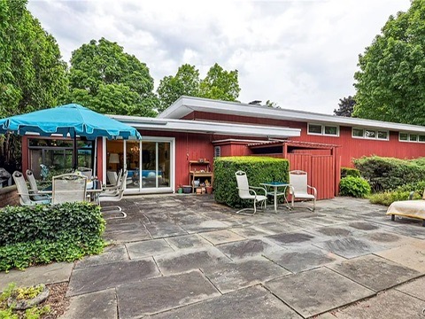 vintage MCM Fayetteville, NY house for sale with retro details, midcentury slate and bluestone patio