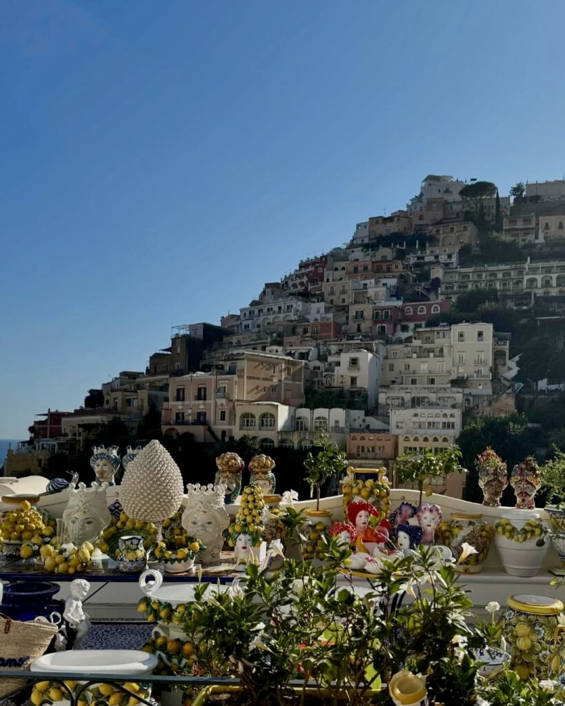 positano beach, terrace overlooking positano italy on the amalfi coast