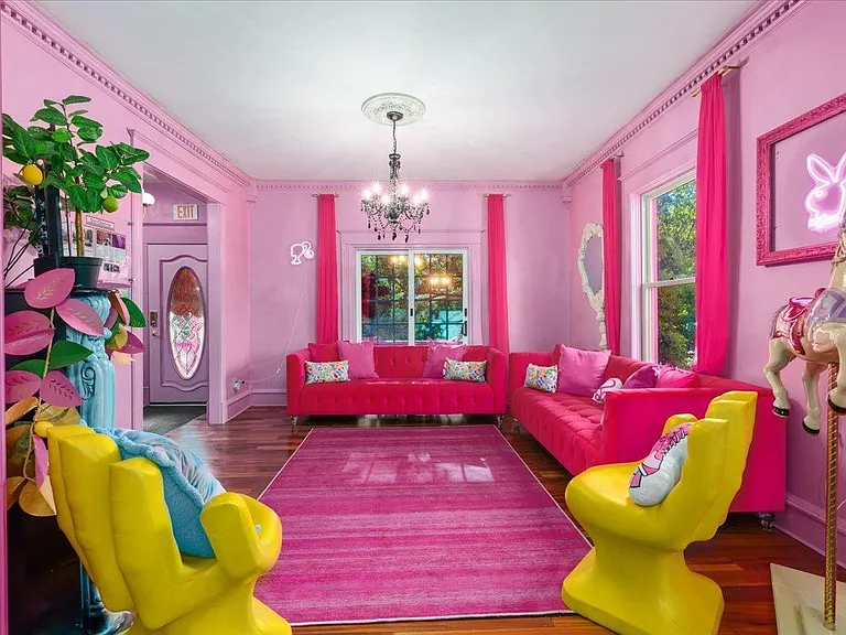 all-pink Barbie Dream House for sale, all pink living room with pink sofas and rugs