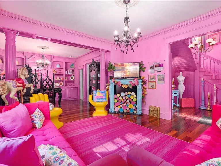 all-pink Barbie Dream House for sale, all pink living room with pink sofas and rugs