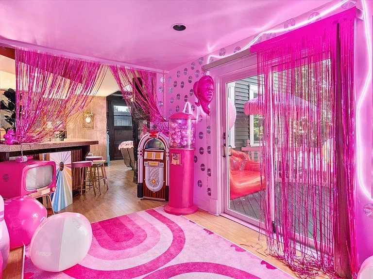 all-pink Barbie Dream House for sale, all pink living room with pink sofas and rugs