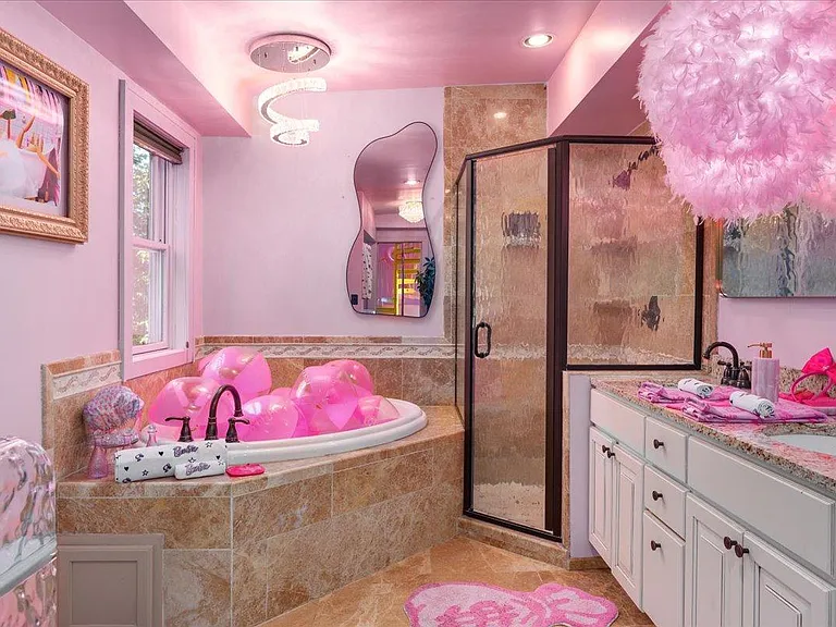 all-pink Barbie Dream House for sale, barbie themed bathroom with pink balloons in the tub