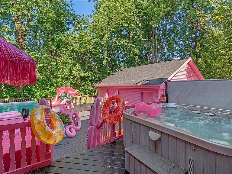 all-pink Barbie Dream House for sale, pink backyard pool perfect for a real life barbie