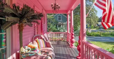 all-pink Barbie Dream House for sale, all pink wraparound porch with pink outdoor sofa