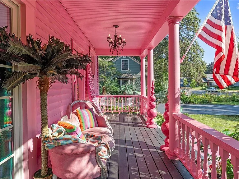 all-pink Barbie Dream House for sale, all pink wraparound porch with pink outdoor sofa