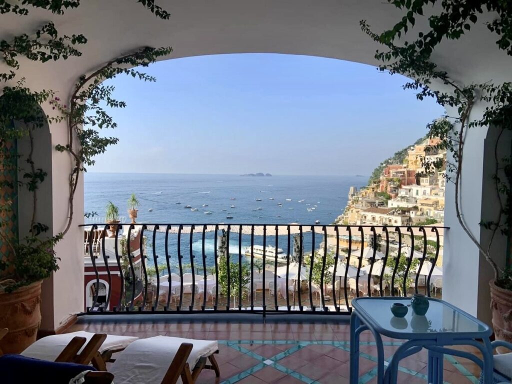 positano beach, terrace overlooking positano italy on the amalfi coast