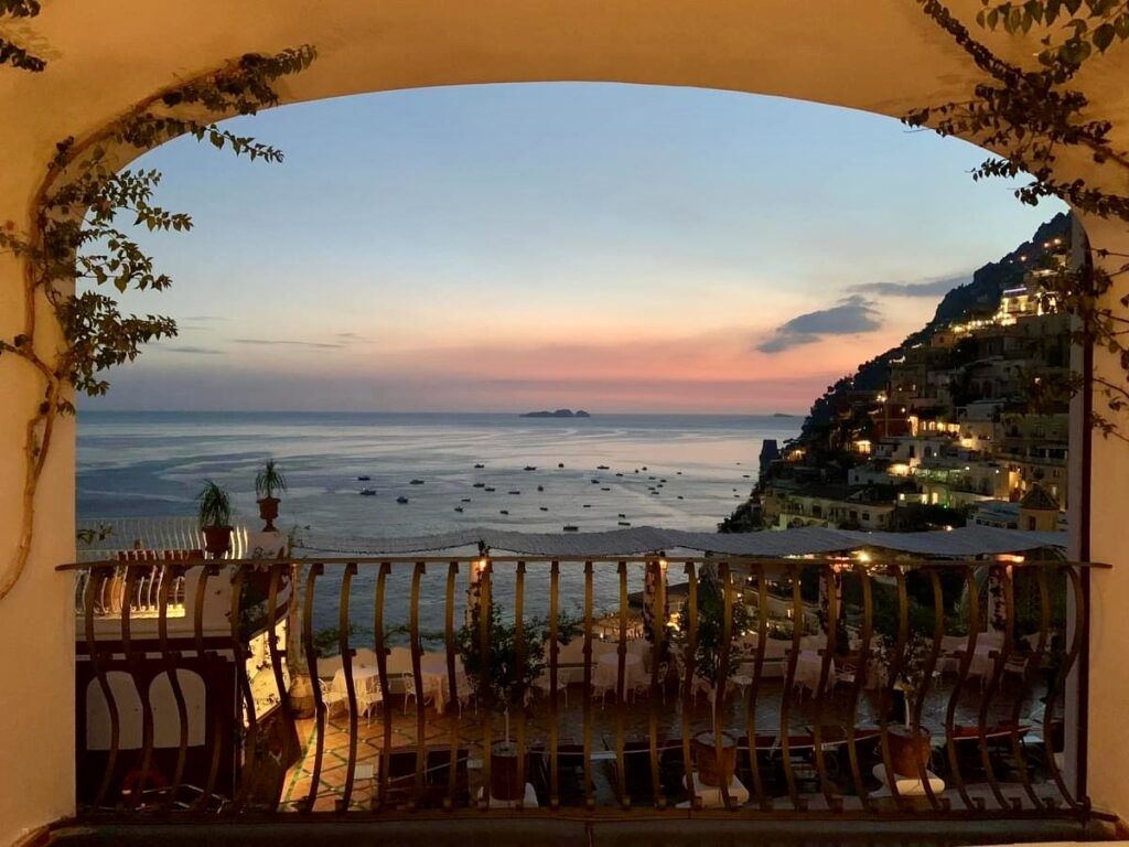 sunset view of positano beach on the amalfi coast of Italy