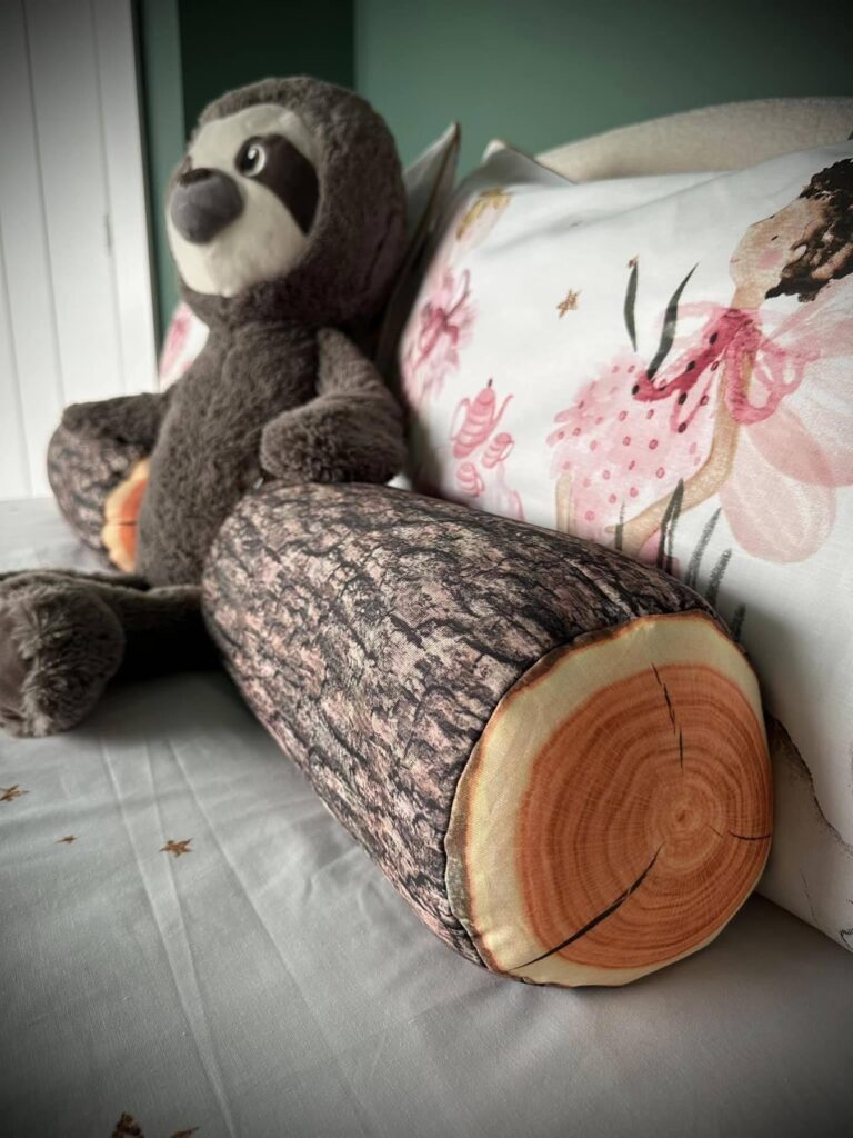 enchanting kids room design, gorgeous forest themed kids bedroom design and floral print bedding with log pillows