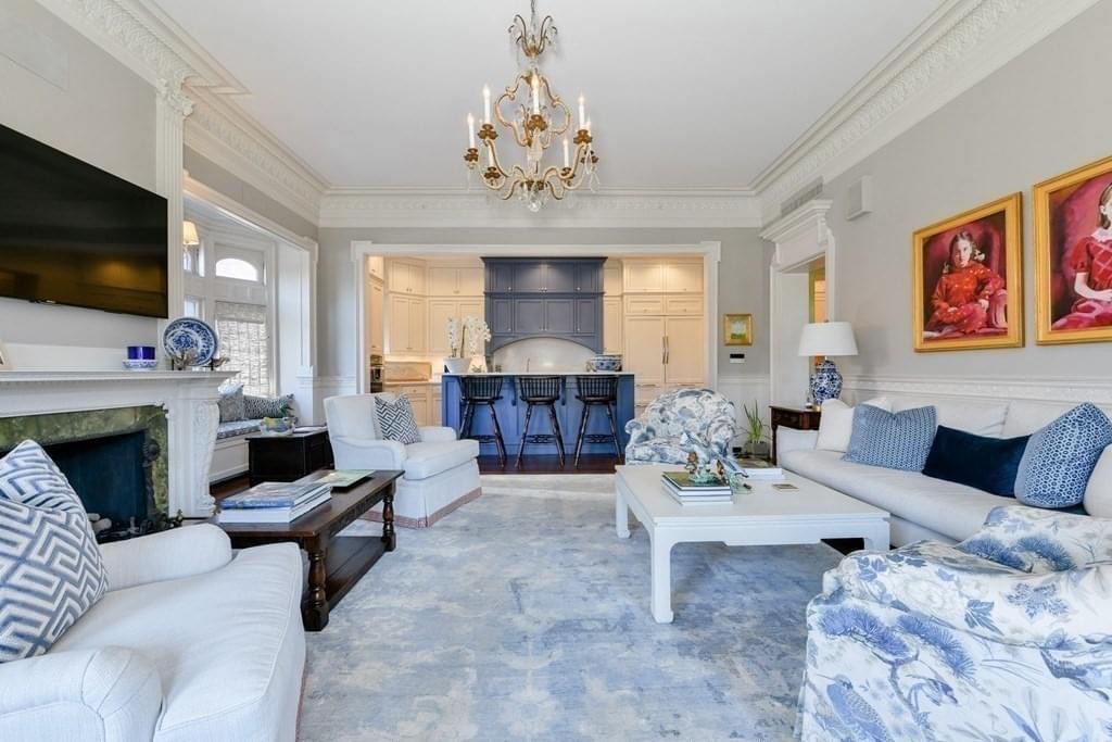 light bright rooms, sun filled kitchen with tall white and navy blue cabinetry and black detailing