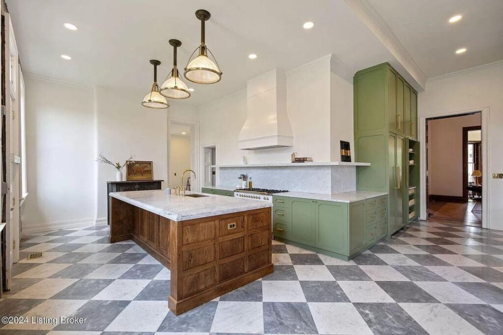 light bright rooms, sage green kitchen cabinets with checkerboard tile floors and wood with white marble center island